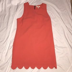 Scalloped hem dress.